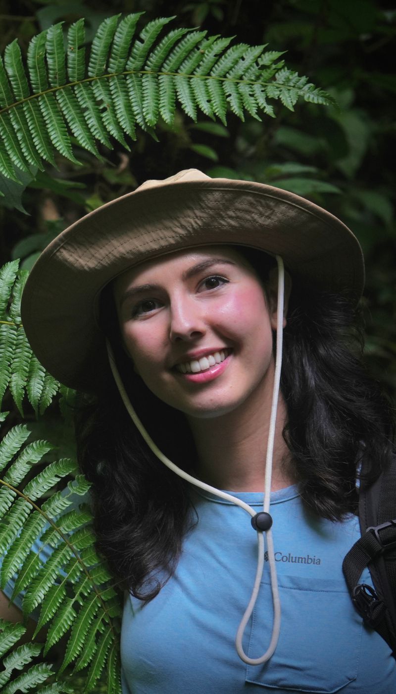 A photo of the author wearing a safari hat