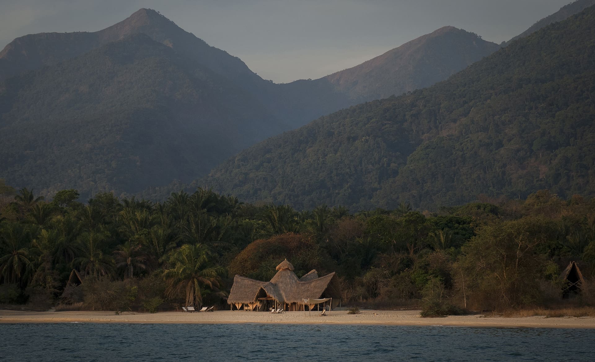 Nat Hab travelers visit Greystoke Mahale in Tanzania, a permanent research center established in 1965 on the shores of sapphire-blue Lake Tanganyika as an extension of Jane Goodall's work with chimpanzees just north at Gombe Stream.